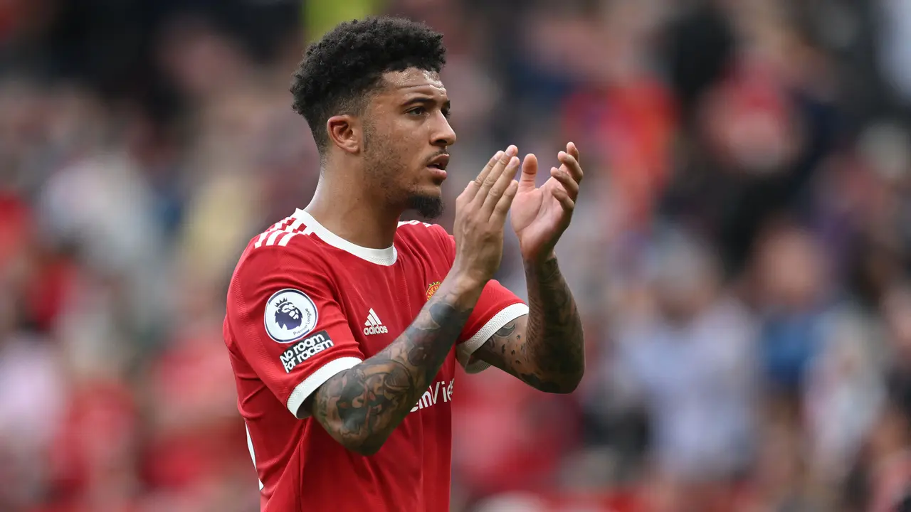 Sempat kesulitan tampil maksimal di lini serang MU, Jadon Sancho mulai nyetel saat kehadiran Ralf Rangnick. Sejak bergabung pada musim panas tahun 2021, ia diketahui telah mencetak lima gol dan tiga assist dari 33 penampilan untuk Setan Merah. (AFP/Paul Ellis)